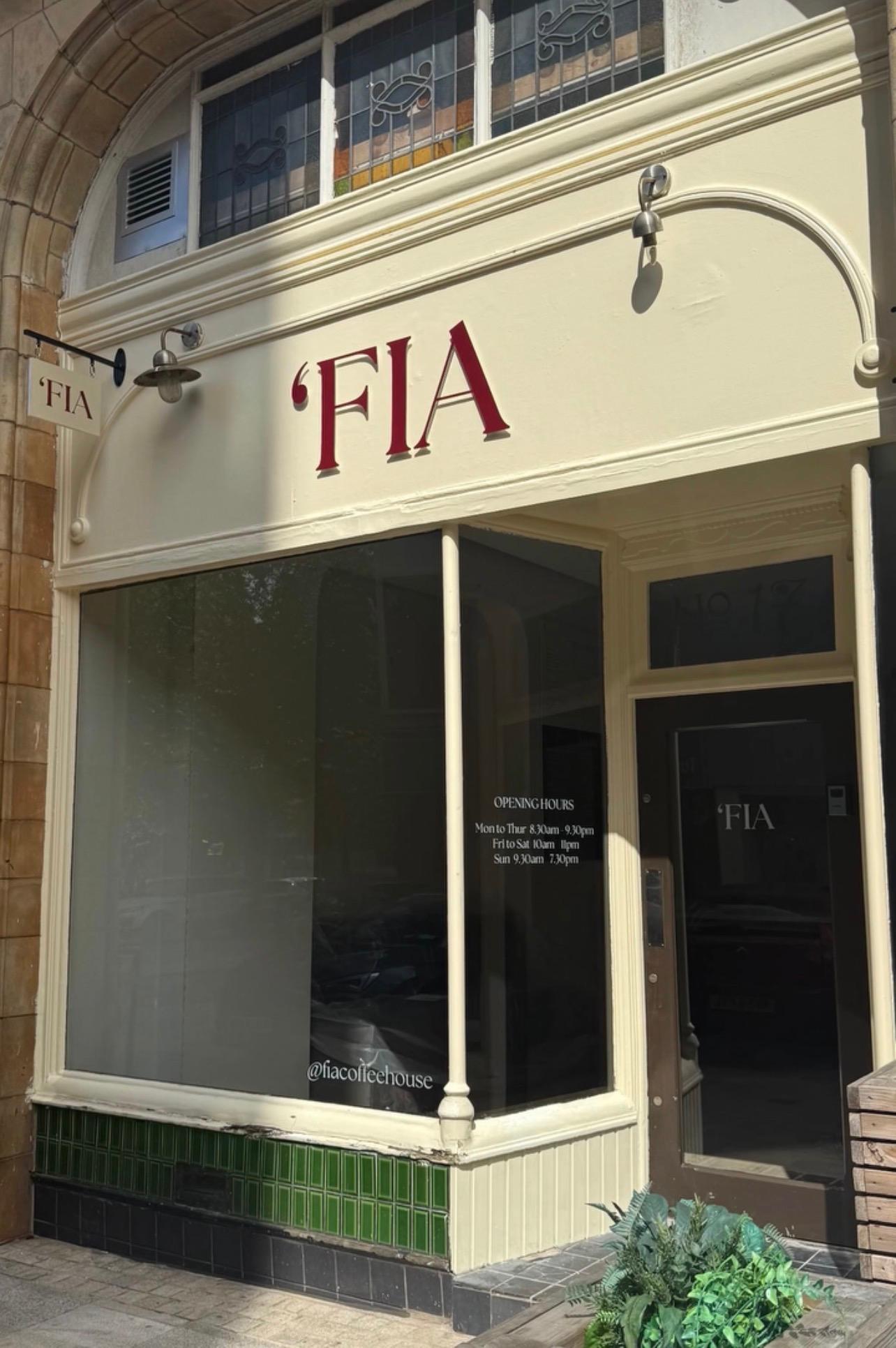 The 'FIA Coffeehouse shopfront on Miller Arcade, Preston — cream art-deco frontage with burgundy signage